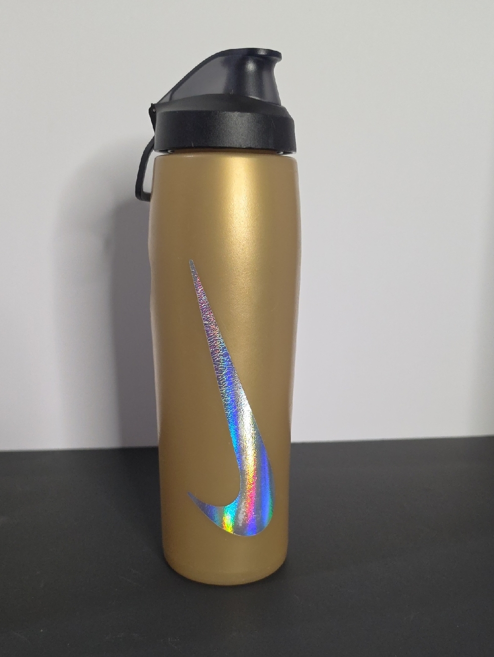 Nike Gold Water Bottle with Holographic Swoosh and Black Lid